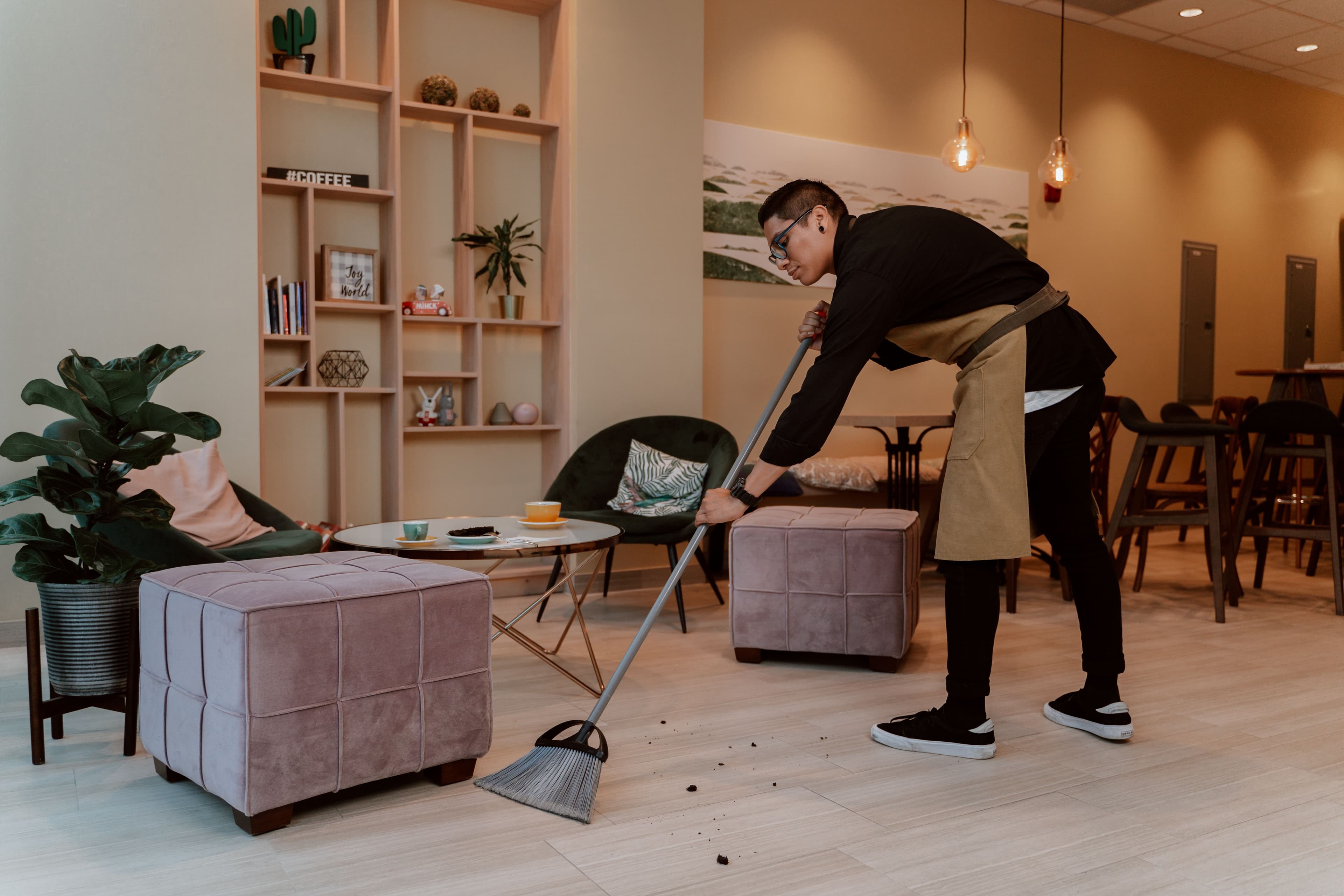 Cleaner wiping surfaces during a property turnaround clean